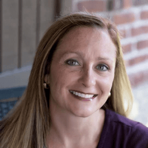 Kim Clark, a white woman with golden hair.