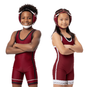 Boy and girl in wrestling uniforms.
