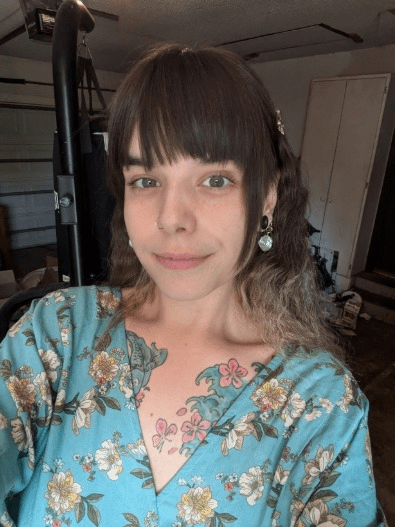 Alecia Freistedt, a white woman with long brown hair.