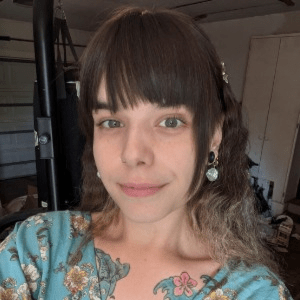 Alecia Freistedt, a white woman with long brown hair.