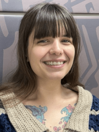 Alecia Freistedt, a white woman with long brown hair.