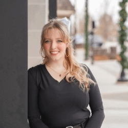 Helena Guzman, a Latina woman with brown hair.