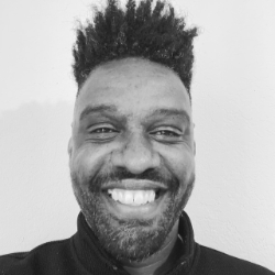 Leon the Jokester, a black man. Photo is black and white.