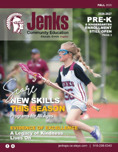 Cover of the Jenks Community Education Fall 2026 brochure. The main image is a girl wearing a Jenks jersey, goggles, and mouth guard, running with a lacrosse stick. Text includes 2026-2027 Pre-K & kindergarten enrollment still open page 3; Score new skills this season programs for all ages; and Evidence of excellence A Legacy of Kindness Lives On