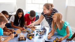 Students using a microscope
